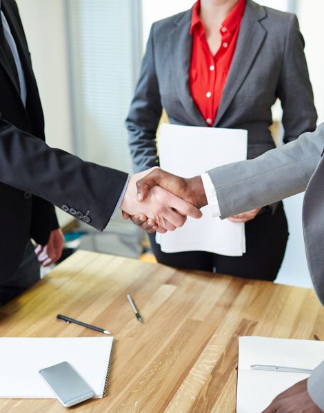 Successful deal Successful business partners handshaking after signing contract